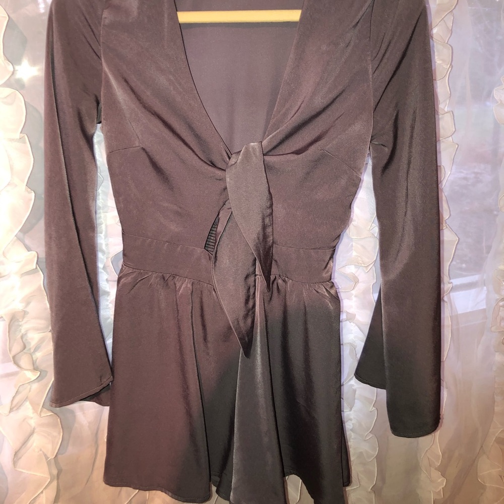 Silver romper ties in front